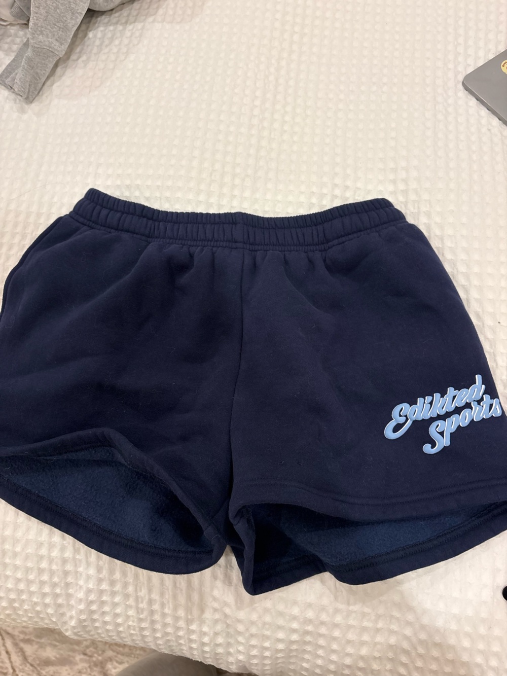 Edikted Navy Blue Shorts with Light Blue Script Logo